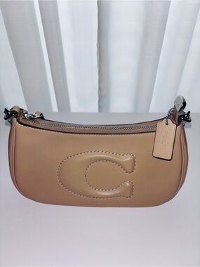 Coach Smooth Leather Teri Shoulder Bag in Tan with an adjustable strap.